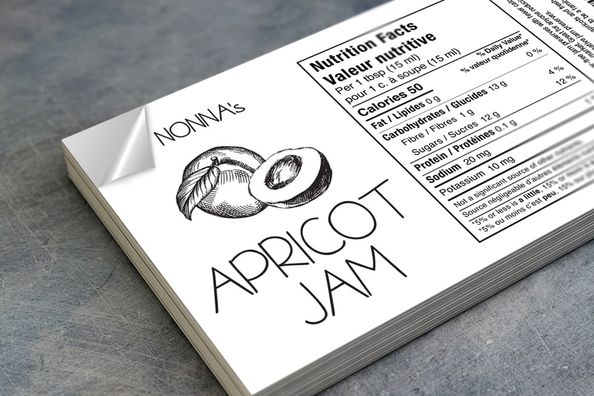 A stack of Die Cut Labels with logo and ingredients list for jam.
