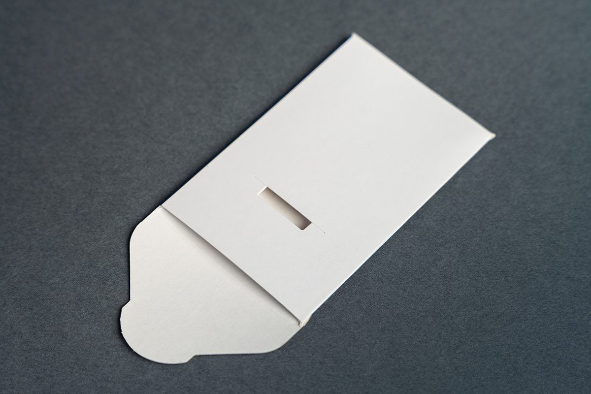 Image showing Card Sleeve Envelope Fold-Over Tuck laying on the flat surface.