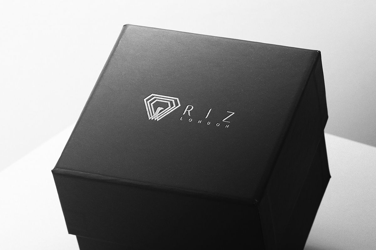 Jewelry Packaging Ideas-Small black custom jewelry box packaging with the silver logo