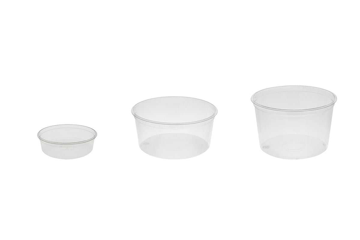 Sustainable Disposable Plastic Food packaging-Three different sizes of clear round disposable plastic food containers on the white background