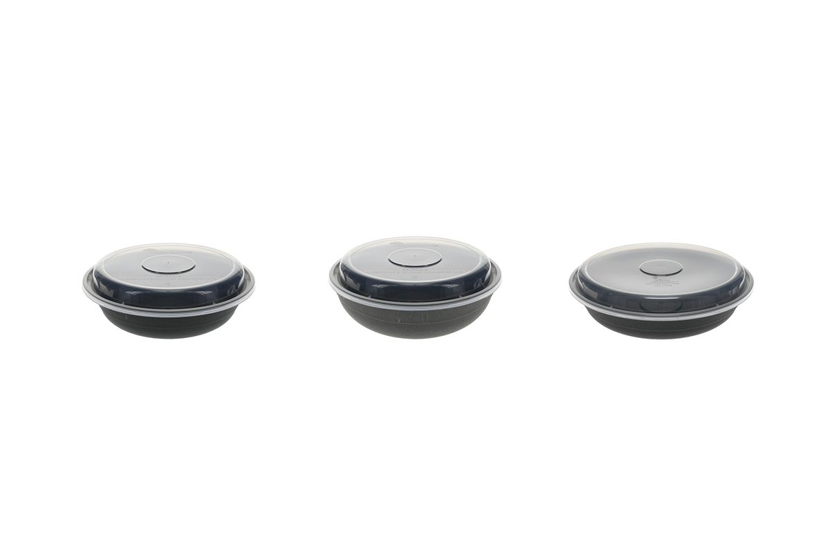 Sustainable Disposable Plastic Food packaging-Three black round disposable plastic food containers with lids on the white background