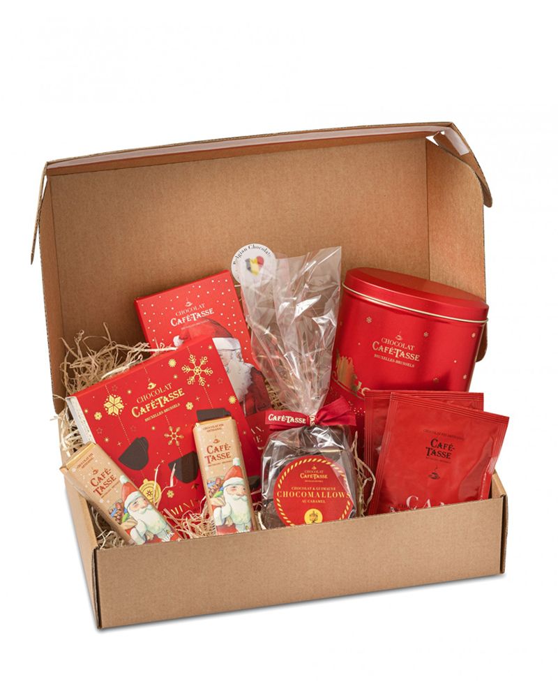 Box full of different products with holiday packaging