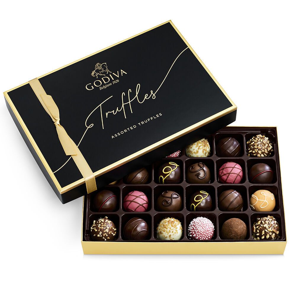 Godiva truffles holiday packaging with black and gold design elements