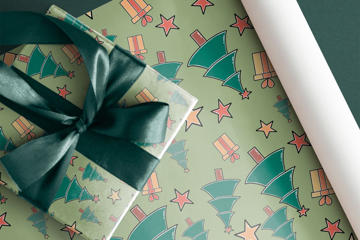 Wrapped gift on a paper sheet as an example of holiday gift packaging ideas
