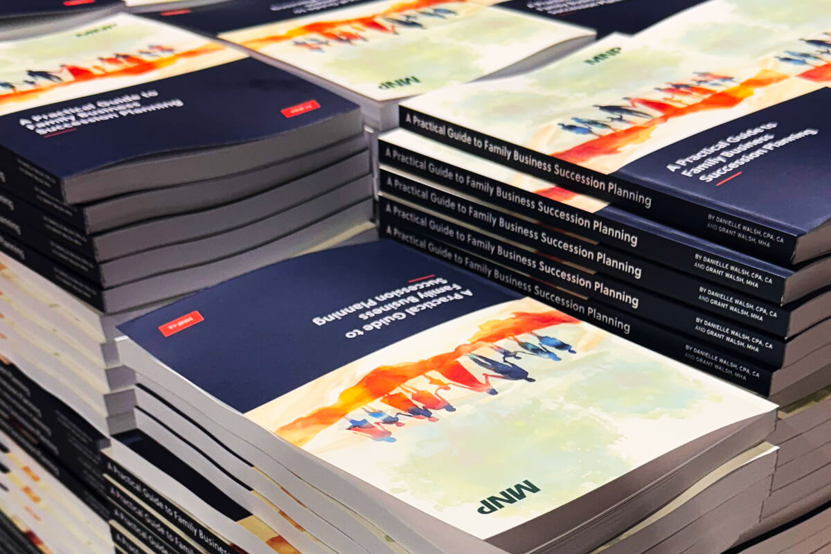 Stack of printed books in full color