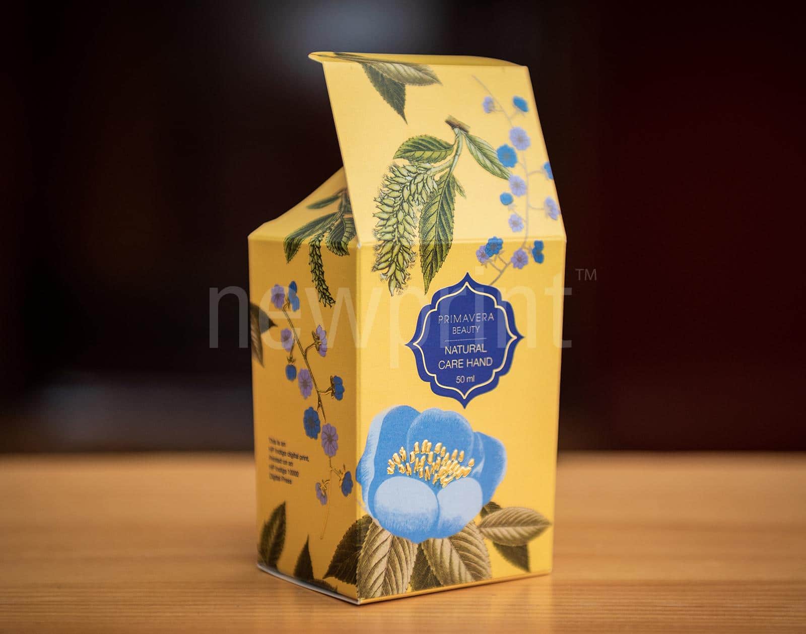 Packaging box with gold foil detail.