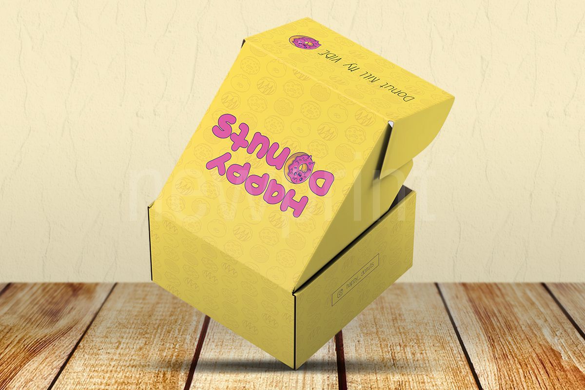 packaging colour - Back and side view of a yellow box for donuts packaging