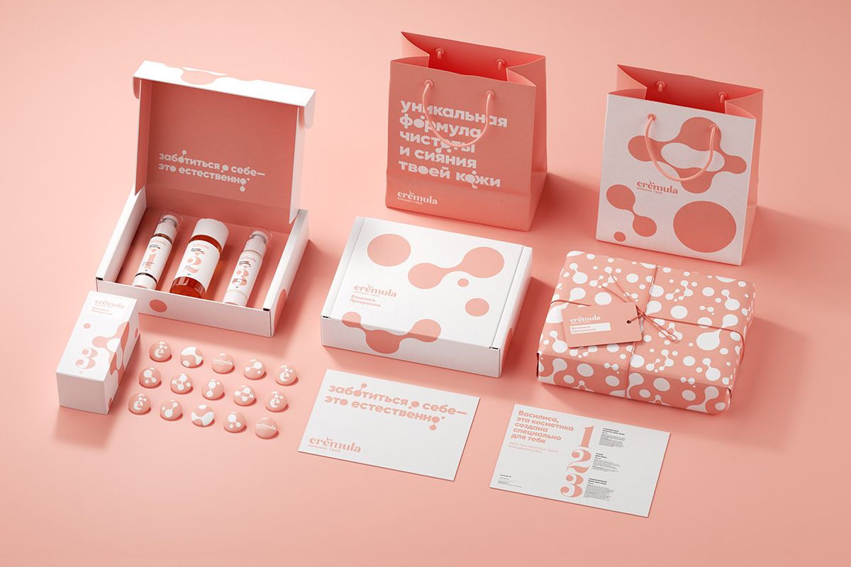 Pink and white osmetic packaging with aditional elements that create the ultimate unboxing experience 