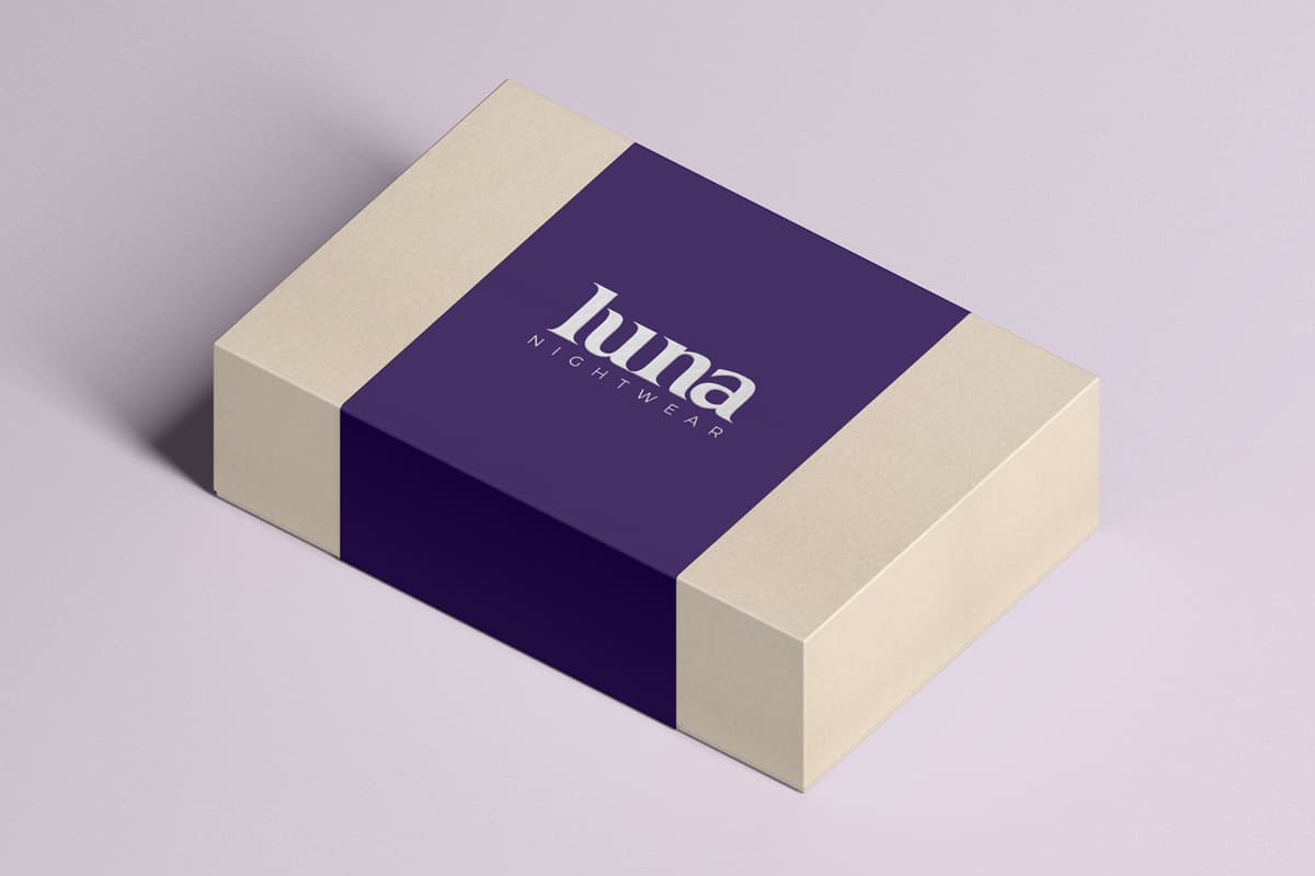 Image showing purple Box Sleeve with logo design on excussive clothing packaging.