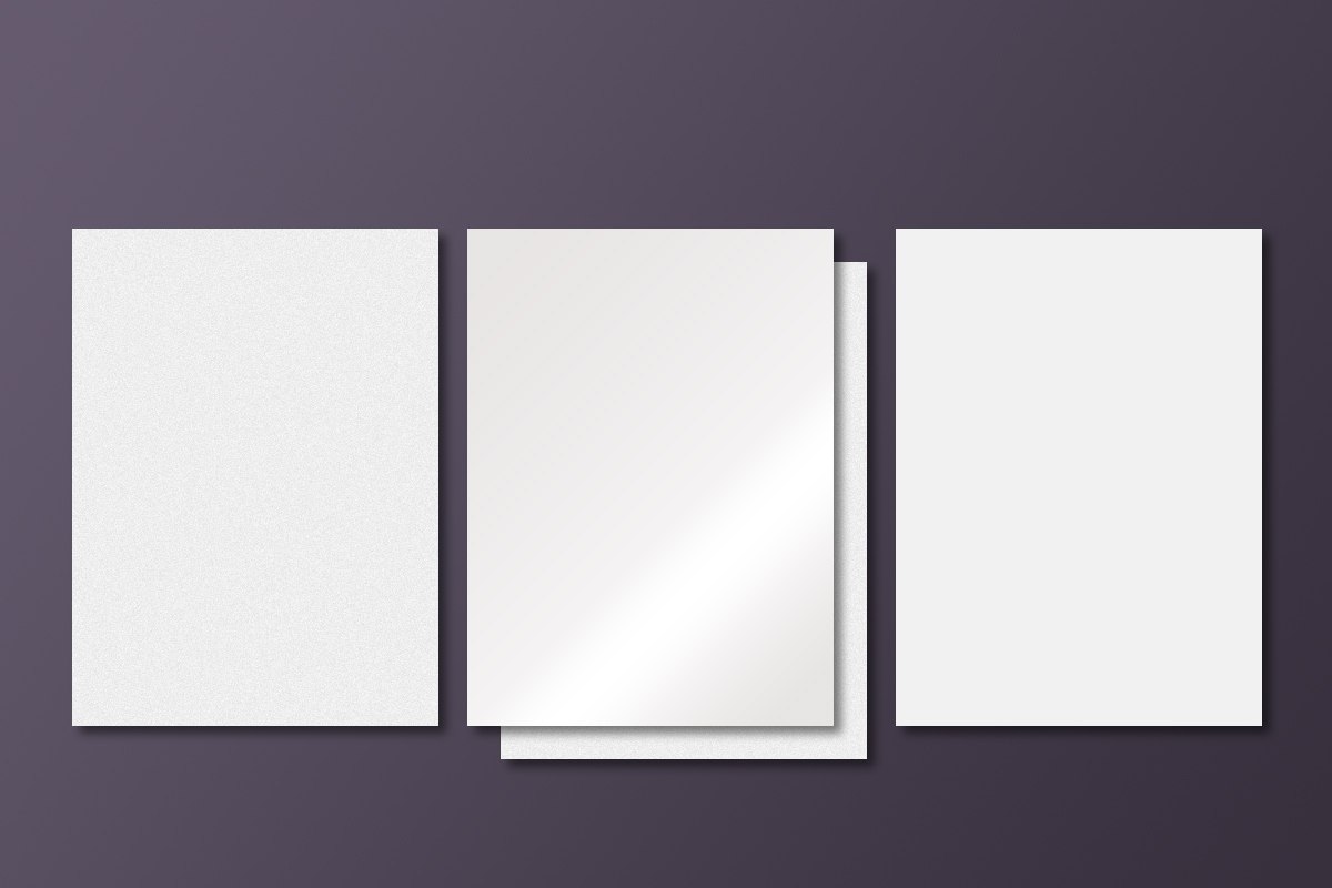 Image showing uncoated, C1S, and silk paper next to each other.