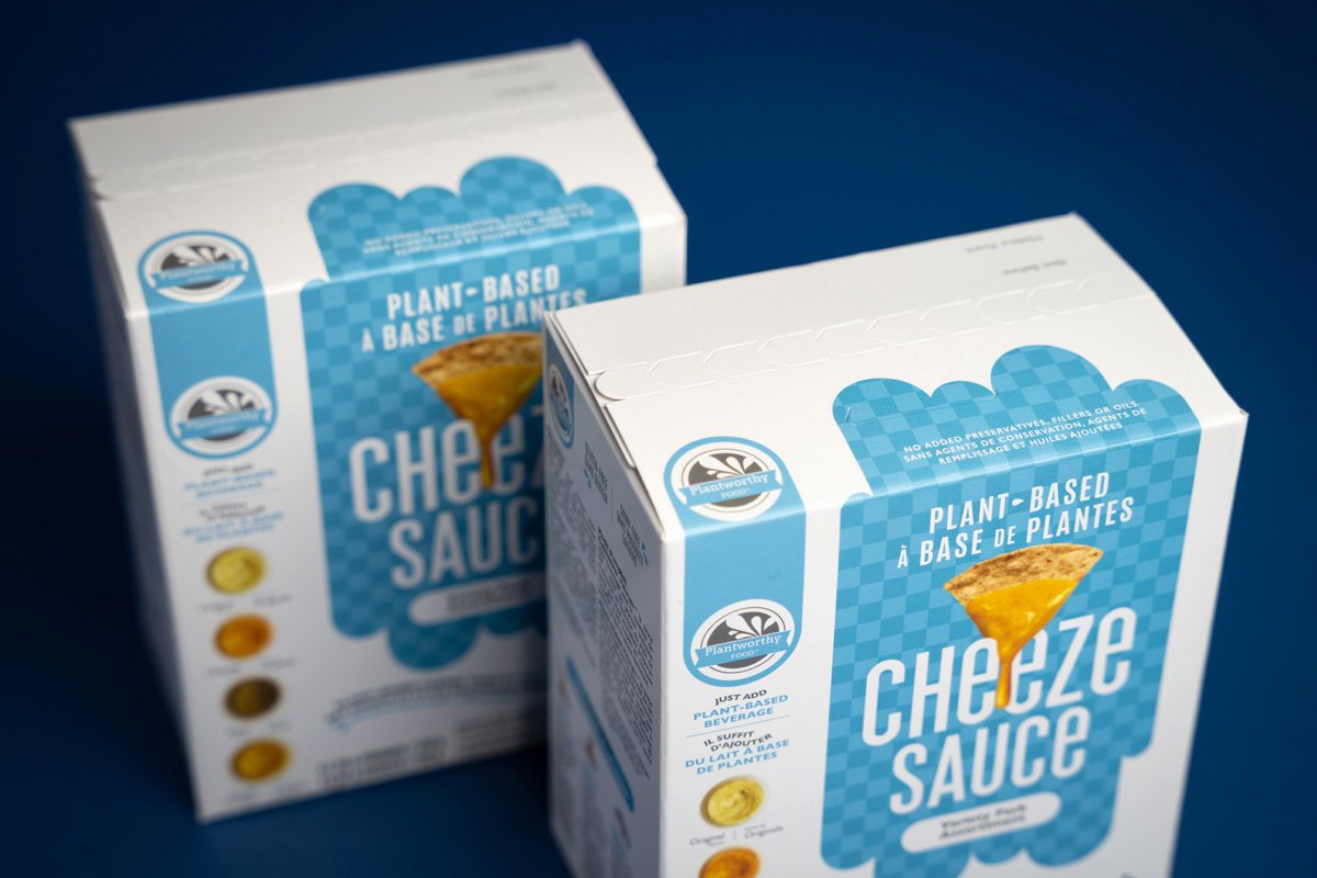 Types of packaging products - two paperboard boxes for cheese sauces.