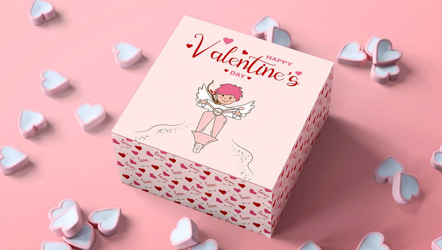 Valentine’s Day packaging, a box with a Cupid on a Vespa illustration on a pink background, and small red hearts around the box.